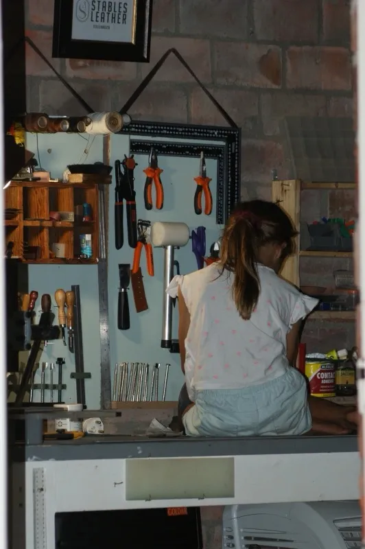 Maia working on riempie weaving