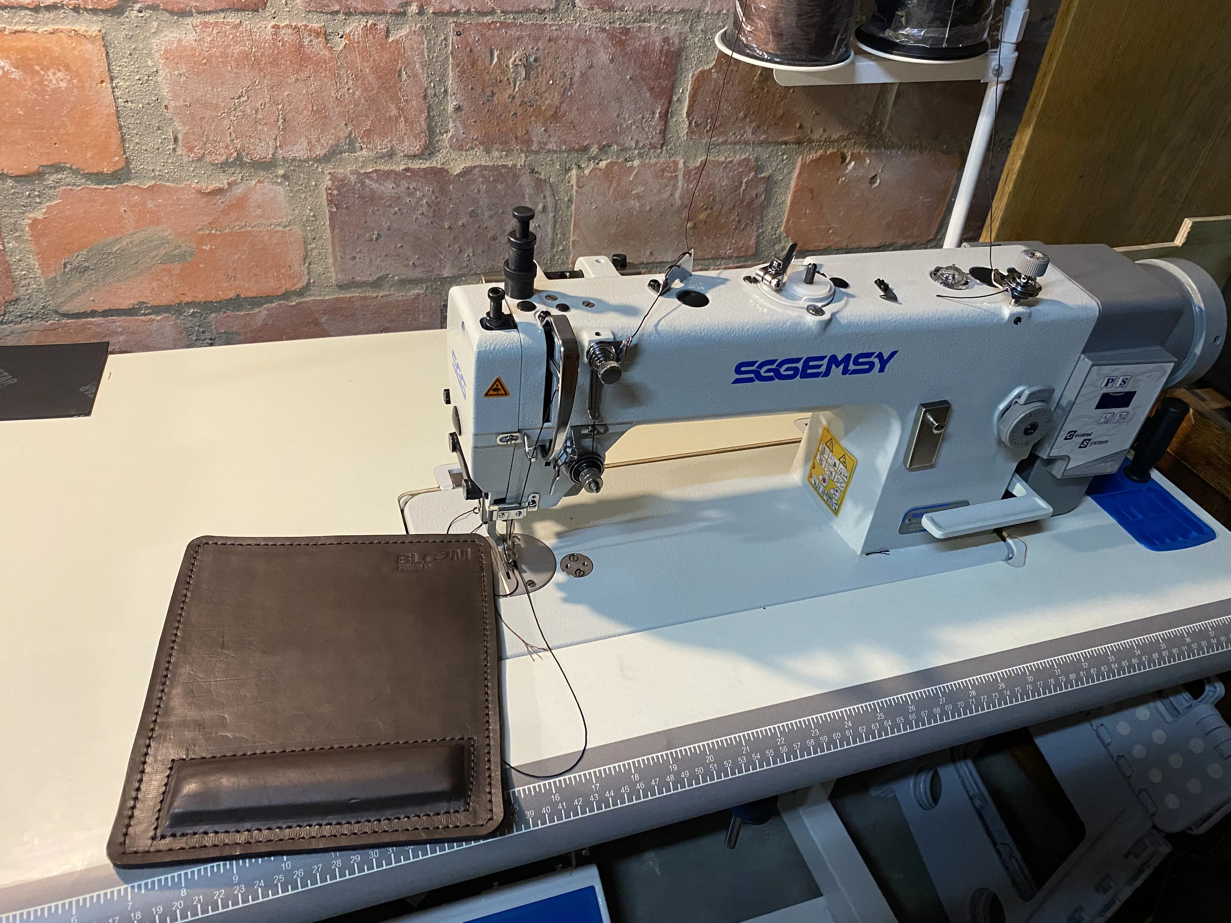 Leather sewing machine at work